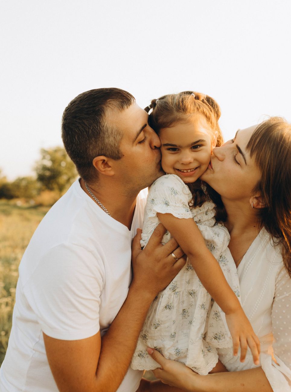 happy family enjoying summer outdoors