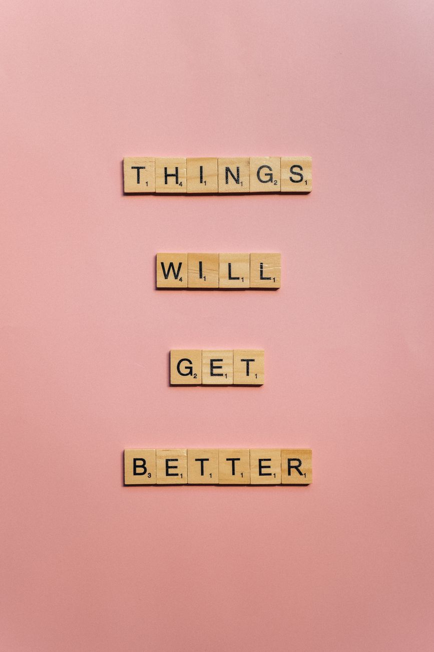 wooden scrabble tiles with message